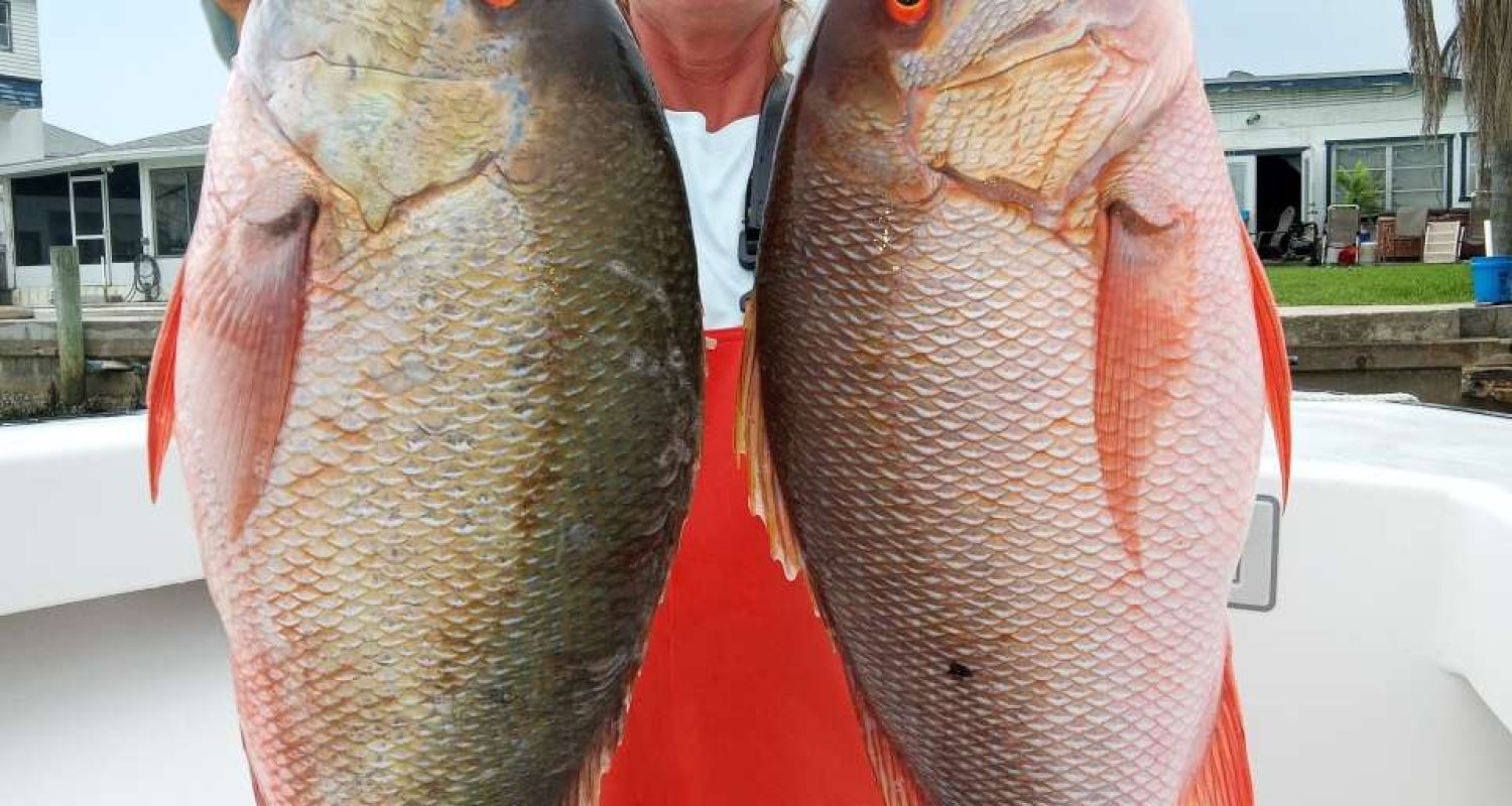 Angler With Catch | Floridafishing.Net